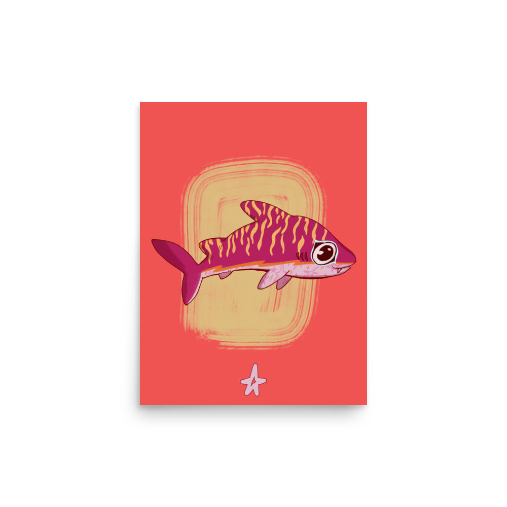 Framed artwork of a fish on a red background in a room with a wooden cabinet and plant.
