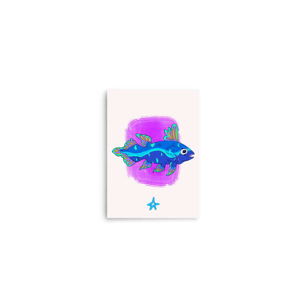 Framed artwork of a blue fish with purple background on a wooden cabinet.
