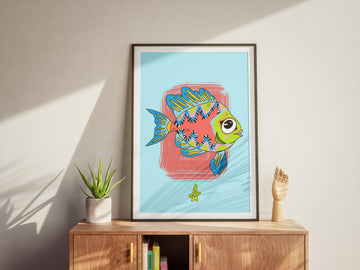 Framed artwork of a colorful fish on a wall above a wooden cabinet.